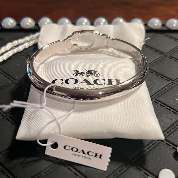 COACH Silver Monogram Clasp Bangle Bracelet - Picture 3 of 4